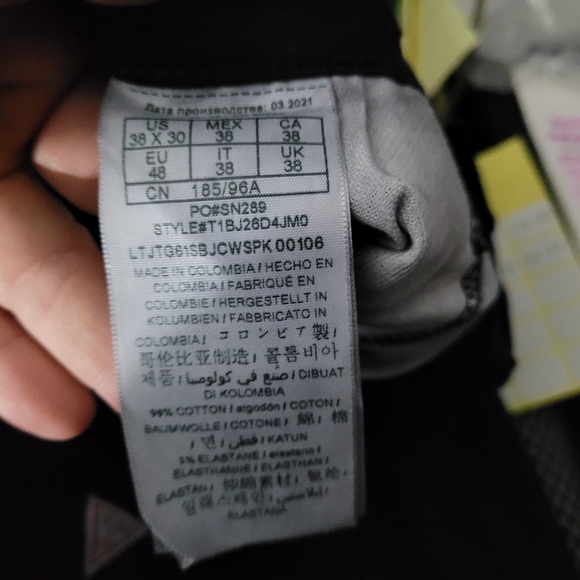 GUESS | Vermont slim fit low rise tapered leg jeans - Picture 8 of 9